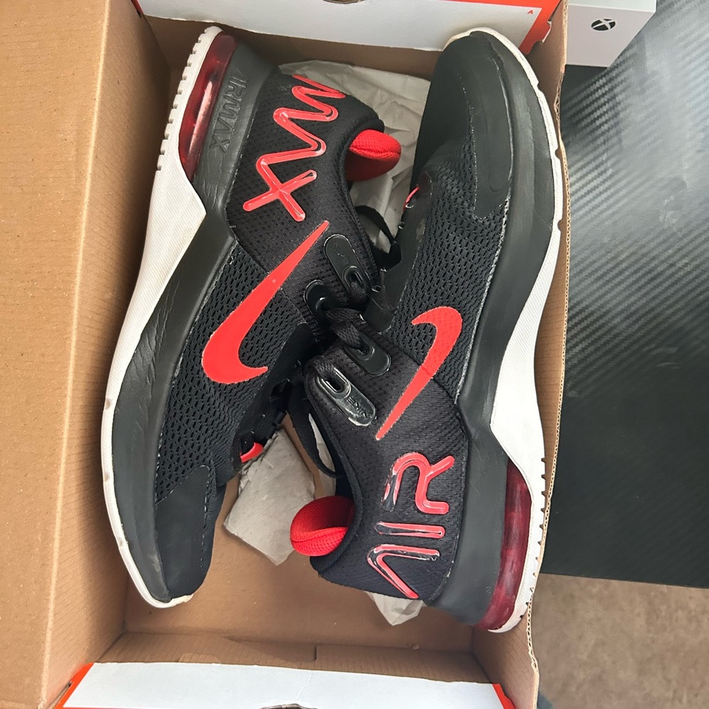 Nike Black and Red Athletic Shoes with Bold Design